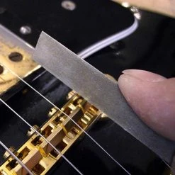 Gauged Nut Slotting Files - StewMac -StewMac Shop 0821 3 inuse saddle