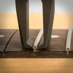 StewMac Precision Fret Puller - StewMac -StewMac Shop 1636 4 close up pulling 3000px