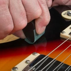 Kovax Tolecut Finish Repair System - StewMac -StewMac Shop 5733 5 inuse on archtop curve 2000